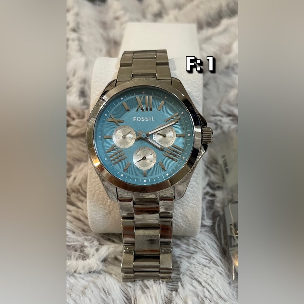 Silver Fossil Watch with Blue face.